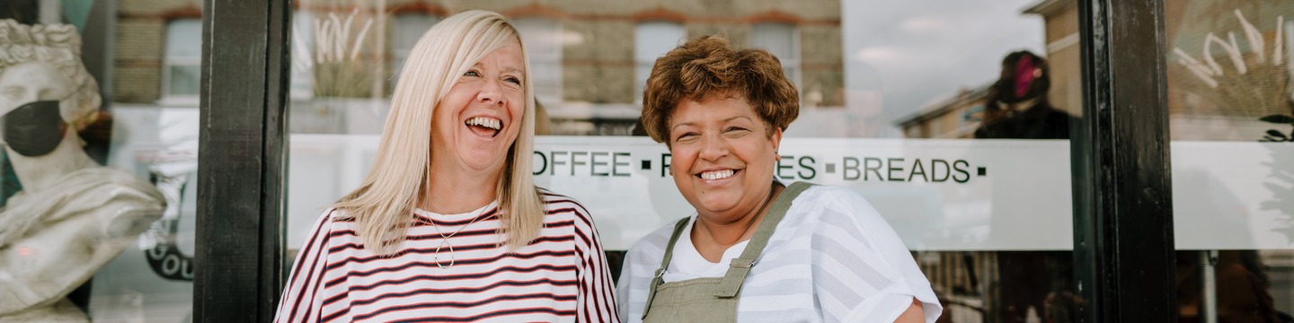 A mixed group of older people smiling
