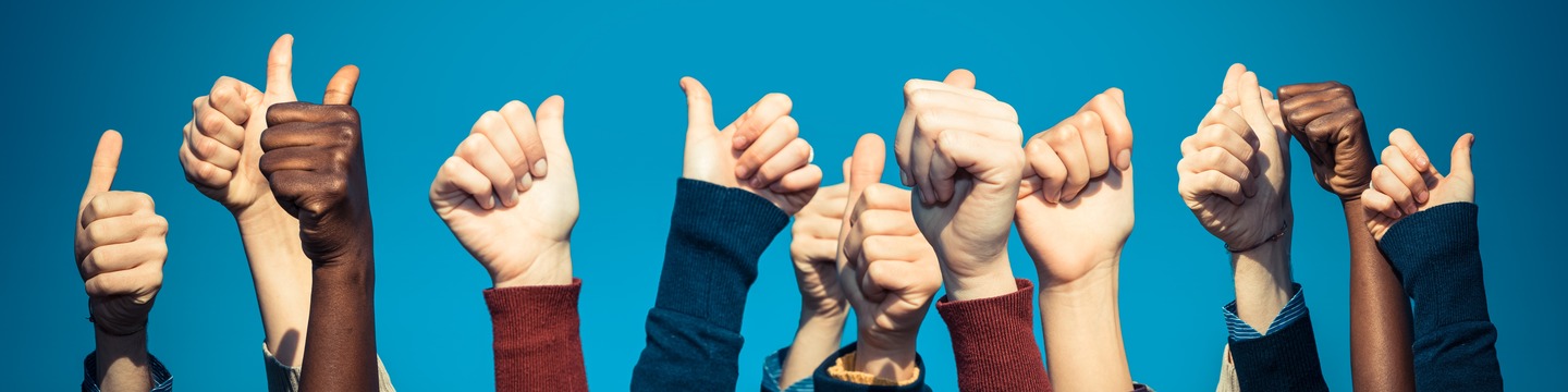 Picture of hands giving the thumbs up sign