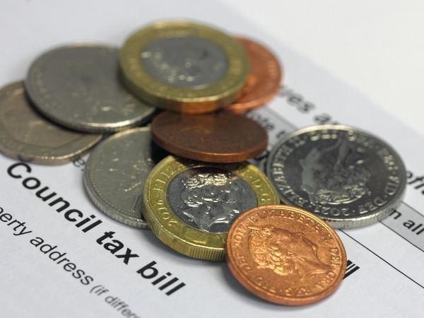 Some coins on a Council Tax bill